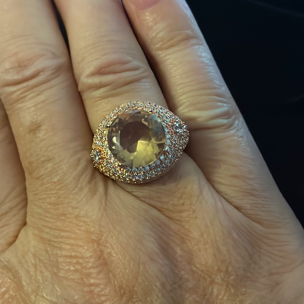 - - Pavet set Rhinestones around Large center Rose colored stone. Sz. 5-6 …